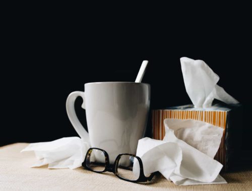 mug with glasses and tissues 